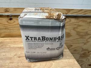 lot 104 image: PREMIER BUILDING SOLUTIONS Case of Xtra Bond 450 Neutral Cure Silicone Sealant- Clear (24 tubes)