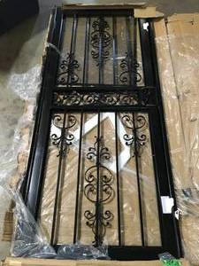 lot 16 image: Grisham 32 in. x 80 in. 409 Series Spanish Lace Steel Black Prehung Security Door  Customer Returns See Pictures