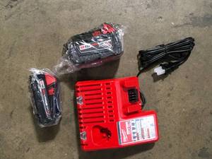 lot 22 image: Milwaukee M18 18-Volt Lithium-Ion Starter Kit with One 5.0 Ah and One 2.0 Ah Battery and Charger  Customer Returns See Pictures