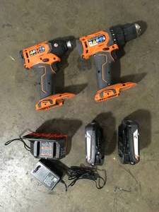 lot 30 image: RIDGID 18V Cordless 2-Tool Combo Kit with 12 in. DrillDriver, 14 in. Impact Driver, (2) 2.0 Ah Batteries, Charger, Customer Returns See Pictures