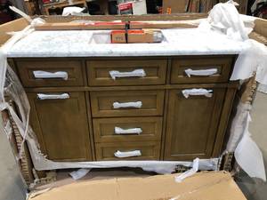 lot 26 image: Home Decorators Collection Caville 48 in. W x 22 in. D x 34.50 in. H Bath Vanity in Almond Latte with Carrara Marble Top   Customer Returns See Pictures