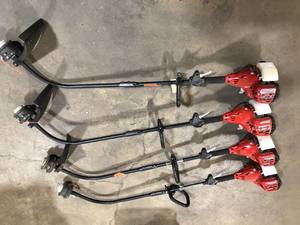 lot 46 image: Lot of Homelite 2-Stroke 26 cc Curved Shaft Gas Trimmer  Customer Returns See Pictures