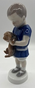 lot 13 image: Bing & Grndahl Boy with Dog Figurine #1747