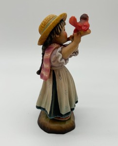 lot 116 image: ANRI Wood Carved Girl Playing Flute Figurine