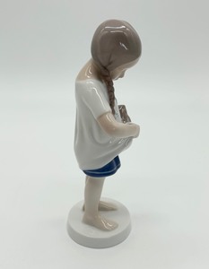 lot 210 image: Bing & Grndahl Denmark Little Girl Holding Kitten Figurine #1779