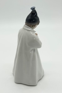 lot 222 image: Royal Copenhagen - Denmark Boy with Umbrella Porcelain Figurine #1145