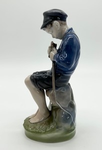 lot 225 image: Royal Copenhagen Boy Cutting a Stick Porcelain Figurine #905