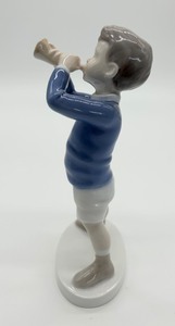 lot 226 image: Bing & Grndahl Boy Blowing Horn Porcelain Figurine #1792
