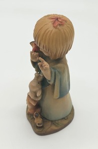 lot 234 image: Hand Carved Wooden Anri Figurine Talking to Animals