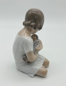 lot 312 image: Royal Copenhagen Girl Holding Doll Porcelain Figurine  #1938