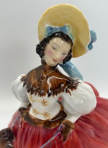 lot 45 image: Royal Doulton The Skater Porcelain Figurine