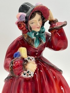 lot 83 image: Royal Doulton Christmas Time Porcelain Figurine HN 2110