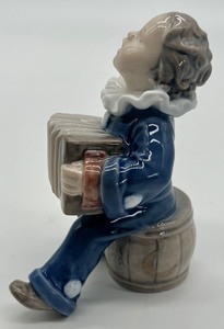 lot 362 image: Royal Copenhagen Boy Playing with Accordion Porcelain Figurine 3667