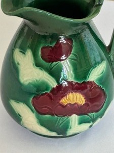 lot 207 image: Vintage Green Glazed Pottery Pitcher with Floral Design