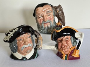 lot 430 image: Three Vintage Royal Doulton Character Mugs including Royal Doulton Character Jug Merlin