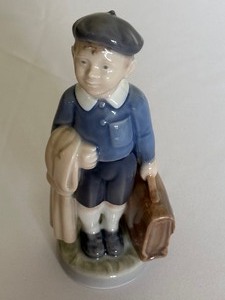 lot 284 image: Royal Copenhagen Boy with Briefcase Porcelain Figurine 4528