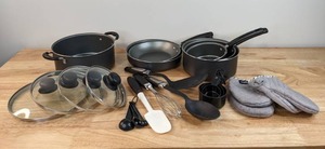 lot 143 image: Tramontina 10-Piece Pots & Pan Set, Assorted Cooking Tools and Oven Mitts K