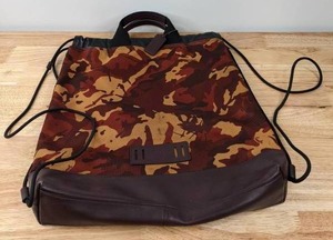 lot 15 image: Coach F76784 Terrain Drawstring Rust Camo Print Backpack K