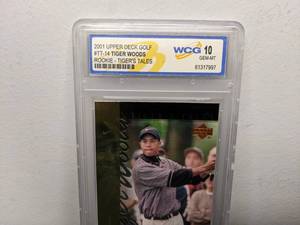 lot 37A image: WCG Graded 10 Tiger Woods 2001 Upper Deck Golf Rookie Tigers Tales Card #TT14 V