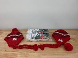 lot 65 image: New Foco Nebraska Womens Size 8 Camo Low Top Canvas Shoes and Two Adidas Nebraska Tassle Knit Hats   N