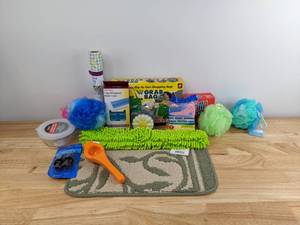 lot 94 image: New Assortment of Items Including Sponges, Kitchen Items, Pill Organizer and More   K