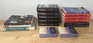 lot 93A image: Assortment of Books Women and the Christian Story, Cook Up Memories, Psychiatric Nursing, FREED, Pandemic Inc., A Boy in Trouble, Grace Unbounded, The Time Left Between Us N