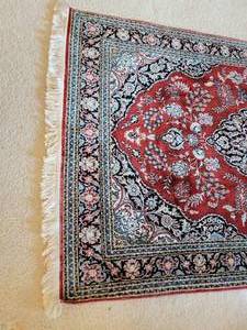 lot 24 image: Elegant Wool Oriental Rug with Bold Color Tones & Wool Weave