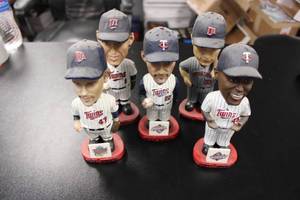 lot 55 image: Minnesota Twins SGA Bobblehead Lot  Radke - Giatti - Morneau - Morris - Hunter