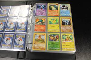 lot 99 image: Pokemon Lot of Mixed Year - Mostly Holos In Pages  300 Cards