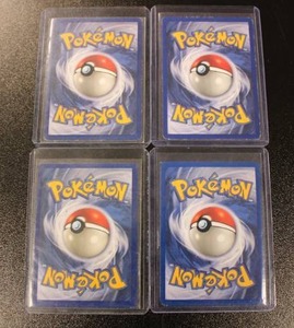 lot 121 image: Raichu Holo Base Set - Kangaskhan Holo Jungle - Vaporeon Holo Jungle - Mr. Mime Holo Jungle