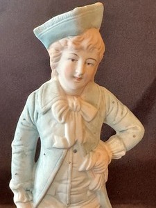 Two Antique Porcelain Figurines including an Antique German Nipper Porcelain Figurine