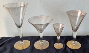 Gold Speckled Stemware and Luncheon Plates