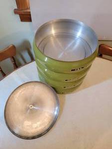lot 26 image: Vintage Stacking Avocado Kitchen Canisters