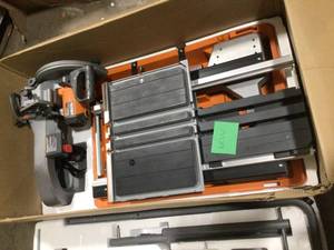 RIDGID 15 Amp 10 in. Wet Tile Saw with Portable Stand   Customer Returns See Pictures