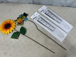 lot 179 image: New Rain Gauges and Lawn Decor