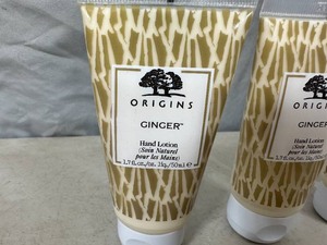 lot 18 image: 15 New Origins Ginger Hand Lotions