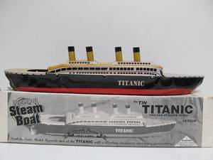 lot 158 image: Mint in Box TITANIC Steam Powered Tin Toy Steamship