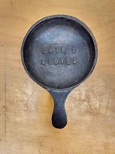 lot 307 image: Small Antique Advertising Cast Iron Skillet - Loths Stoves