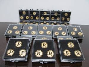 lot 184 image: Lot of 26 Sets of Metal Golf Ball Markers wLetters