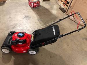 lot 47 image: Troy-Bilt 21in. 140cc Briggs & Stratton Self Propelled Gas Lawn Mower with Mulching Kit Included  Customer Returns See Pictures