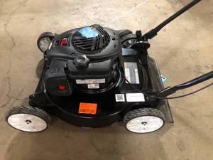 lot 49 image: Murray 20 in. 125 cc Briggs & Stratton Walk Behind Gas Push Lawn Mower with 4 Wheel Height Adjustment and Prime N Pull Start  Customer Returns See Pictures