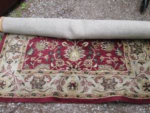 lot 57 image: Autumn tone floral area rug