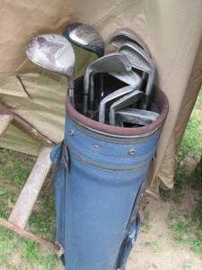 lot 255 image: Golf clubs in holder.