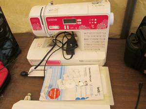 lot 261 image: Brother CX155LA sewing machine.