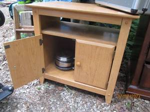 lot 186 image: 2-Door wood microwave stand.