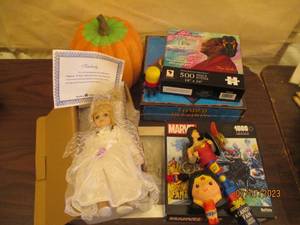 lot 229 image: Puzzles, games, toys, porcelain doll