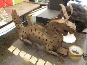 lot 236 image: Cut Metal dragon decor.