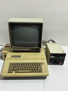 lot 2 image: Vintage Apple IIe Computer, Zenith Data Systems Monitor, Floppy Disk Drives, AppleWorks Start-up Disk and Games