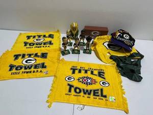 lot 26 image: Green Bay Packers Fan Lot - Bobbleheads, Title Towels, Bad Call Brick, and More