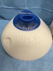 lot 45 image: Vicks Warm Mist Humidifier and Philips Respironics InnoSpire Elegance Aerosol Delivery System